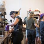 Students making coffee at work