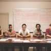 Photo of Alex Jen, Williams Class of 2018, center, who curated the exhibition 