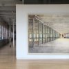 Photograph of a large water color painting of the interior of Building 6, an expansion of the Massachusetts Museum of Contemporary Art, painted by Barbara Ernst Prey, Williams Class of 1979.