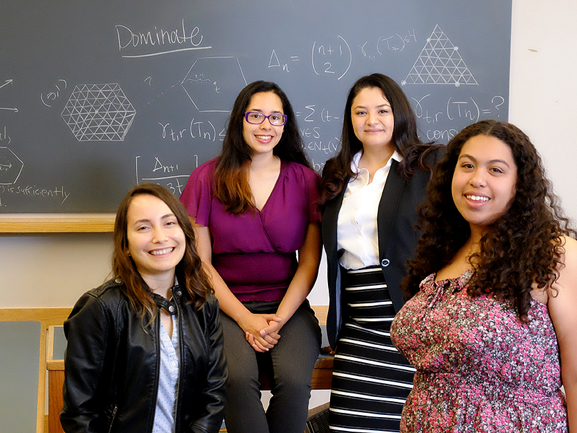 From left: Nohemi Sepulveda ’18, Dalia Luque ’18, assistant professor of mathematics Pamela Harris, and Claudia Reyes ’18.